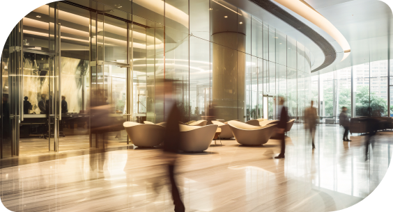 Blurred motion of businesspeople in a lobby.