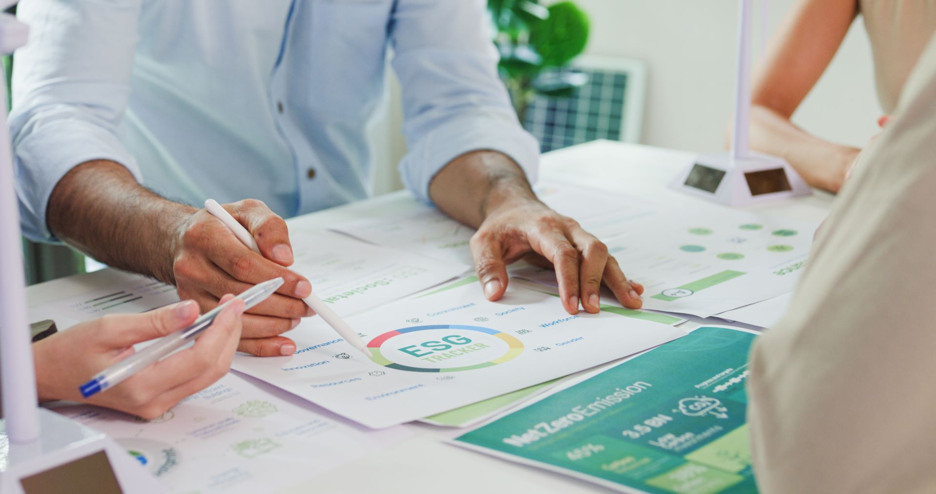 Closeup group of businesspeople discussing ESG strategies